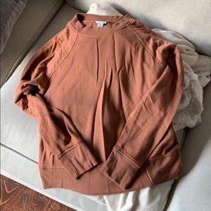 Burnt orange sweater